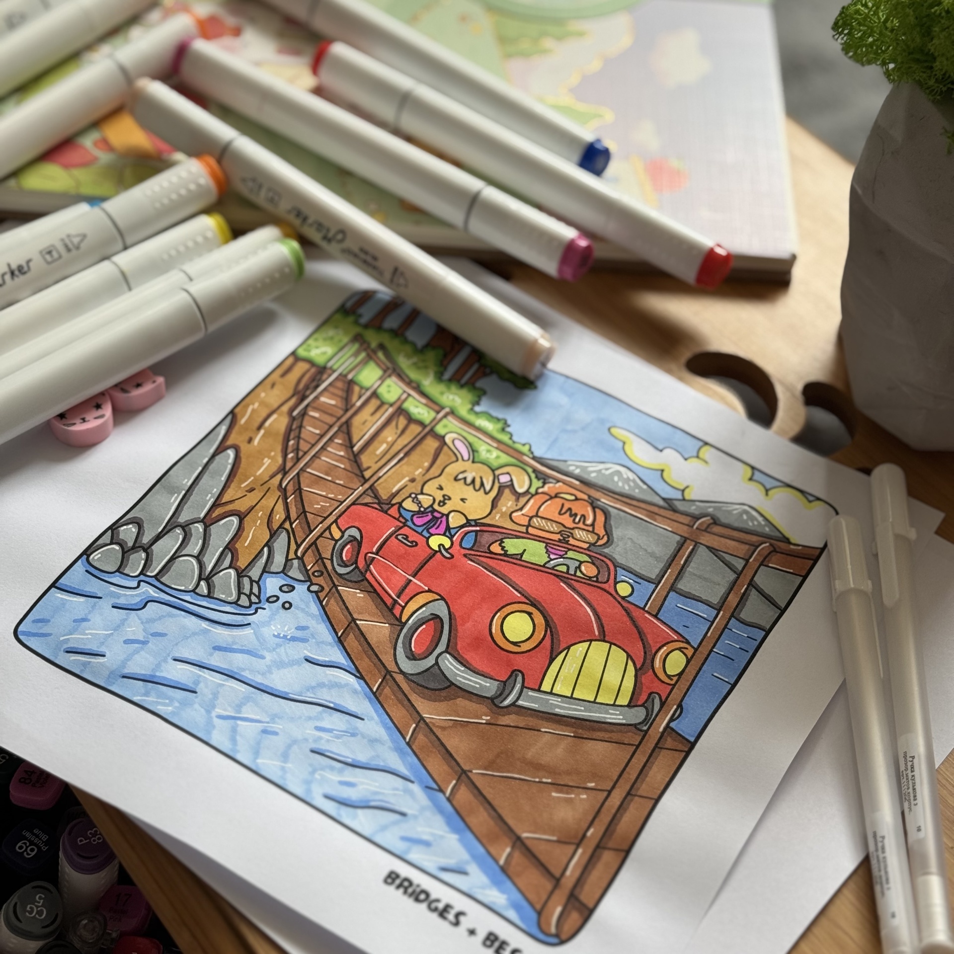 Coloring a Party Animals page with a set of bright markers